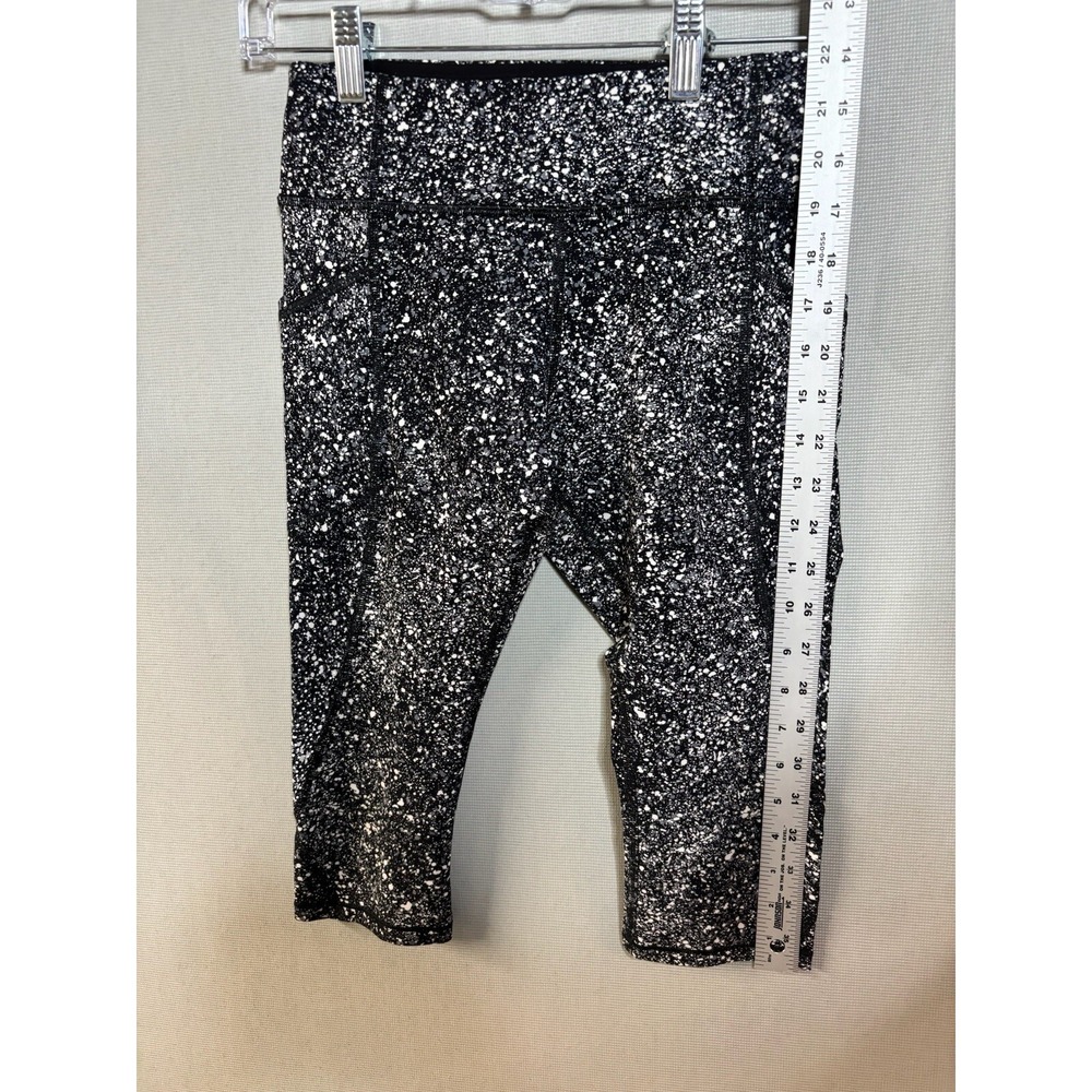 LULULEMON Capri Leggings 22" Sz 6  Black Splattered Paint - Picture 9 of 10